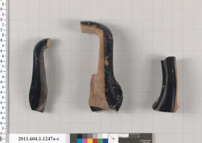 Terracotta fragments of kylikes (drinking cups)