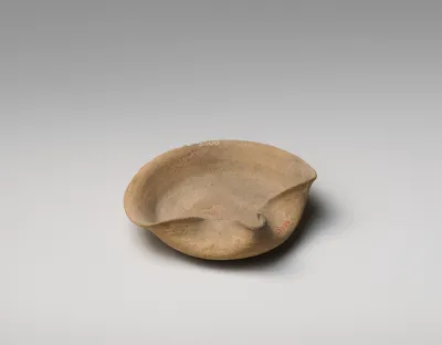 Terracotta saucer-shaped lamp