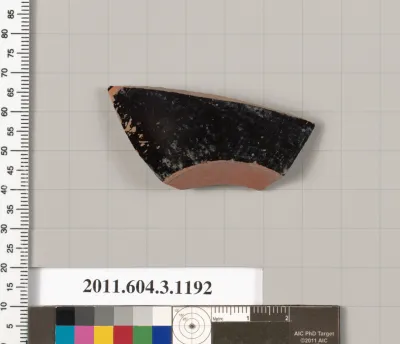 Terracotta fragment of a mastoid (drinking cup with narrow base)