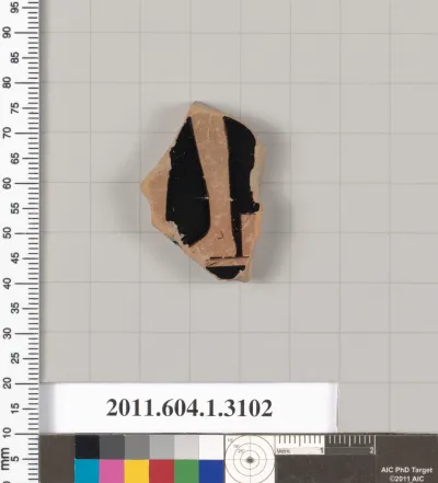 Terracotta fragment of a kylix (drinking cup)