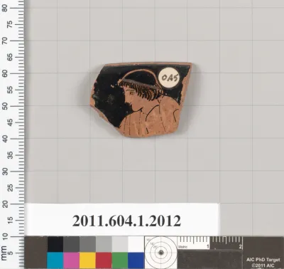 Terracotta rim fragment of a kylix (drinking cup)