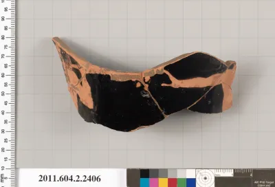 Terracotta fragment of a head kantharos (drinking cup with high handles)?
