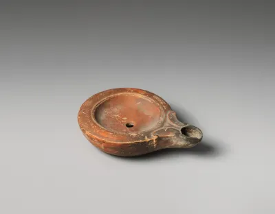 Terracotta oil lamp
