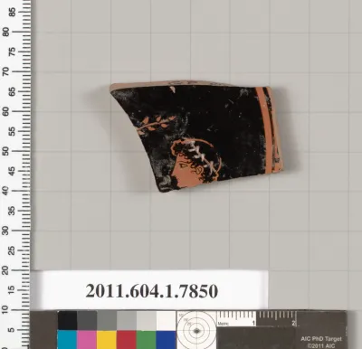 Terracotta fragment of a kylix (drinking cup)