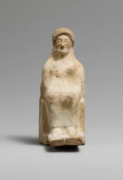 Terracotta statuette of a seated woman