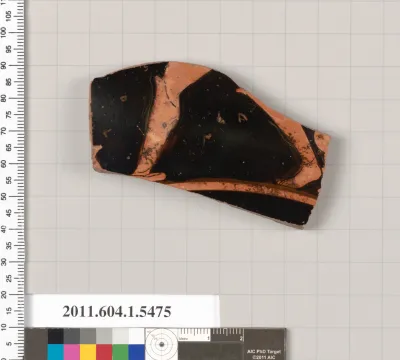 Terracotta fragment of a kylix (drinking cup)