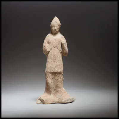 Standing female figurine