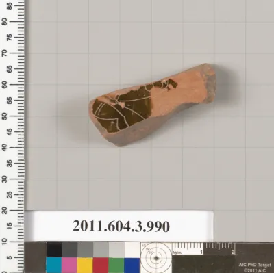 Terracotta fragment of a lekanis lid (covered dish)