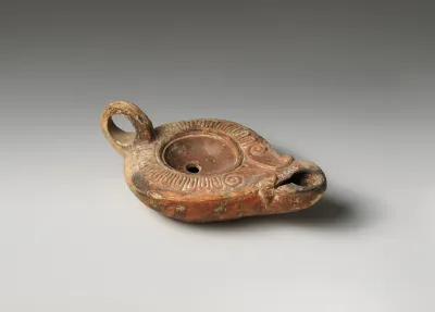 Terracotta oil lamp