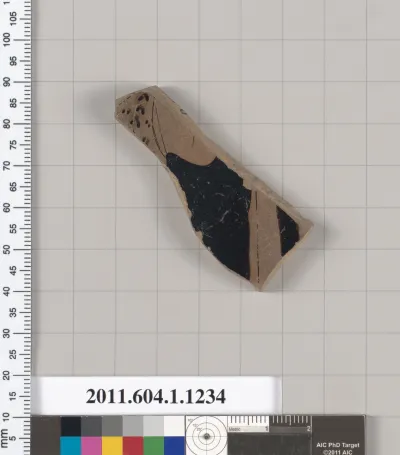 Terracotta fragment of a kylix (drinking cup)