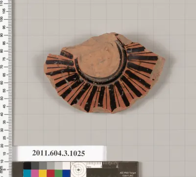 Terracotta fragment of a lekanis lid (covered dish)?