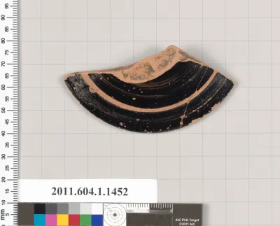 Terracotta fragment of a kylix (drinking cup)