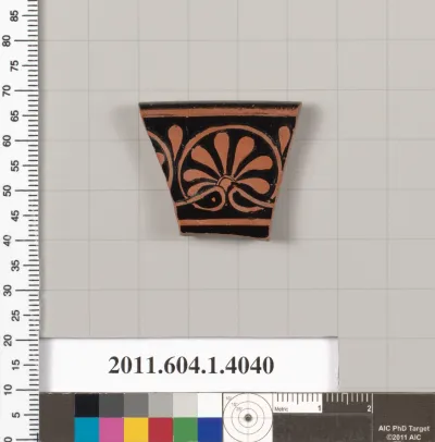 Terracotta fragment of a kylix (drinking cup)