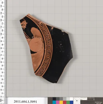 Terracotta fragment of a kylix (drinking cup)