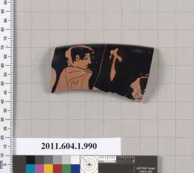 Terracotta fragment of a kylix (drinking cup)