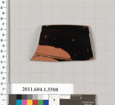 Terracotta rim fragment of a kylix (drinking cup)