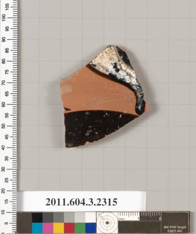 Terracotta fragment of a kylix: eye-cup (drinking cup)