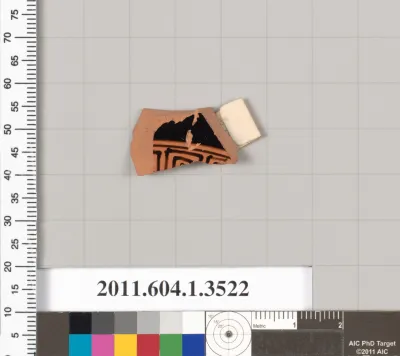 Terracotta fragment of a kylix (drinking cup)