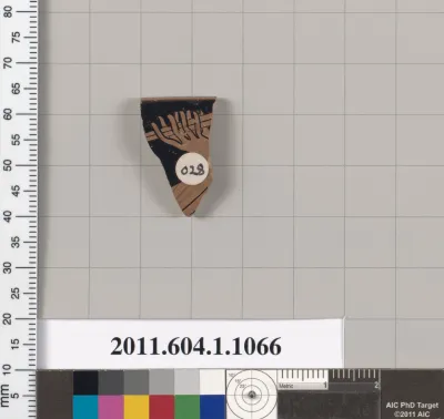 Terracotta rim fragment of a kylix (drinking cup)