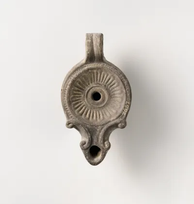 Terracotta oil lamp
