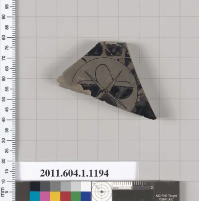 Terracotta fragment of a kylix (drinking cup)