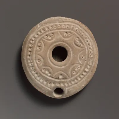 Terracotta oil lamp