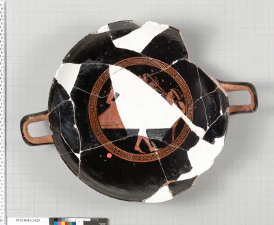 Terracotta fragment of a kylix (drinking cup)