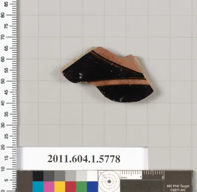 Terracotta fragment of a kylix: eye-cup  (drinking cup)