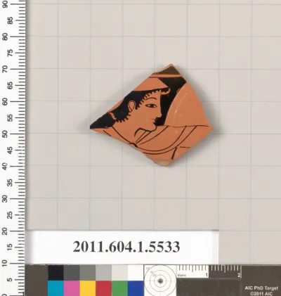 Terracotta fragment of a kylix (drinking cup)