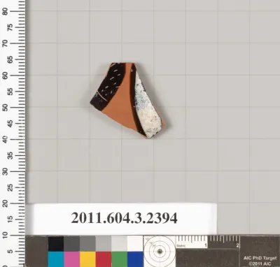 Terracotta fragment of a kylix: eye-cup (drinking cup)