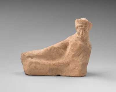 Terracotta statuette of a reclining youth