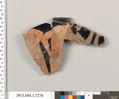 Terracotta rim fragment of a kylix (drinking cup)