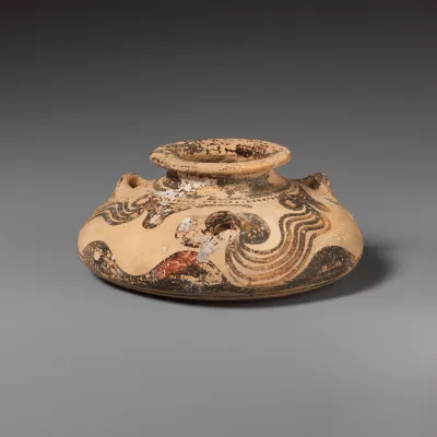 Terracotta squat alabastron (jar)