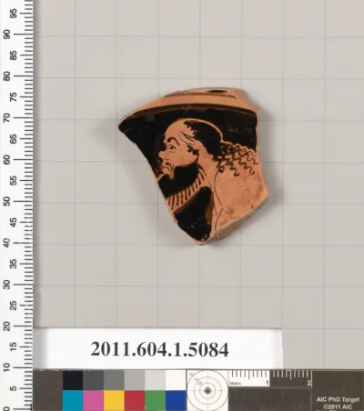 Terracotta fragment of a kylix (drinking cup)