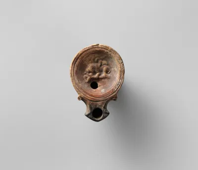 Terracotta oil lamp