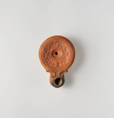 Terracotta oil lamp
