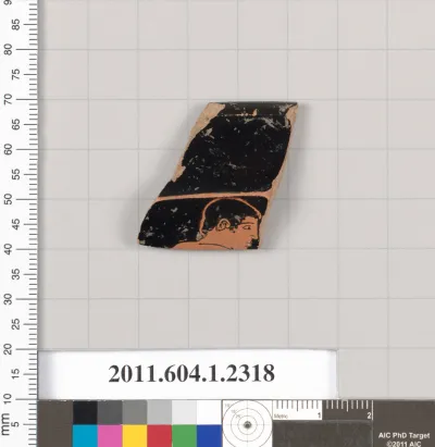 Terracotta rim fragment of a kylix (drinking cup)