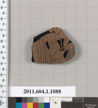 Terracotta fragment of a kylix (drinking cup)