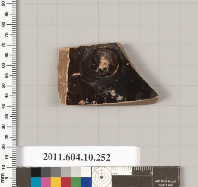 Terracotta fragment of a closed shape