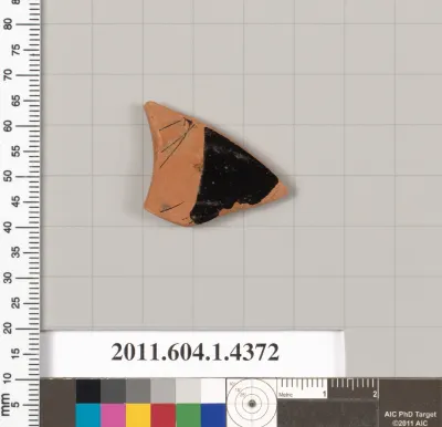 Terracotta fragment of a kylix (drinking cup)