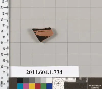 Terracotta fragment of a kylix (drinking cup)