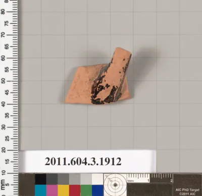 Terracotta fragment of a kylix (drinking cup) or a skyphos (deep drinking cup)?