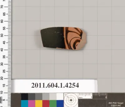 Terracotta fragment of a kylix (drinking cup)