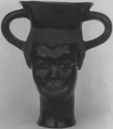 FIGURE VASE, KANTHAROS (ATHENIAN, RED-FIGURE)