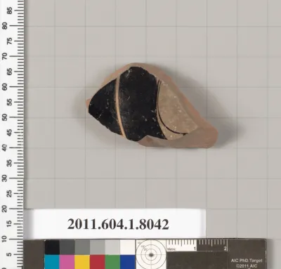 Terracotta fragment of a kylix (drinking cup)