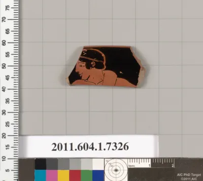 Terracotta rim fragment of a kylix (drinking cup)