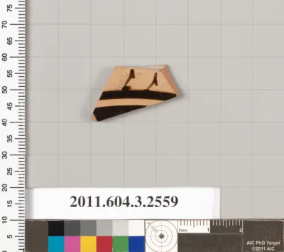 Terracotta fragment of a kylix (drinking cup)