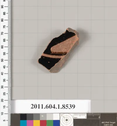 Terracotta fragment of a stemless kylix (drinking cup)