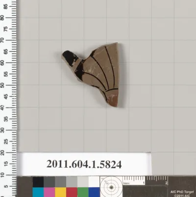 Terracotta fragment of a kylix: eye-cup  (drinking cup)