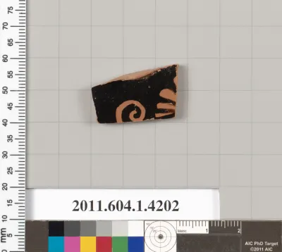 Terracotta fragment of a kylix (drinking cup)